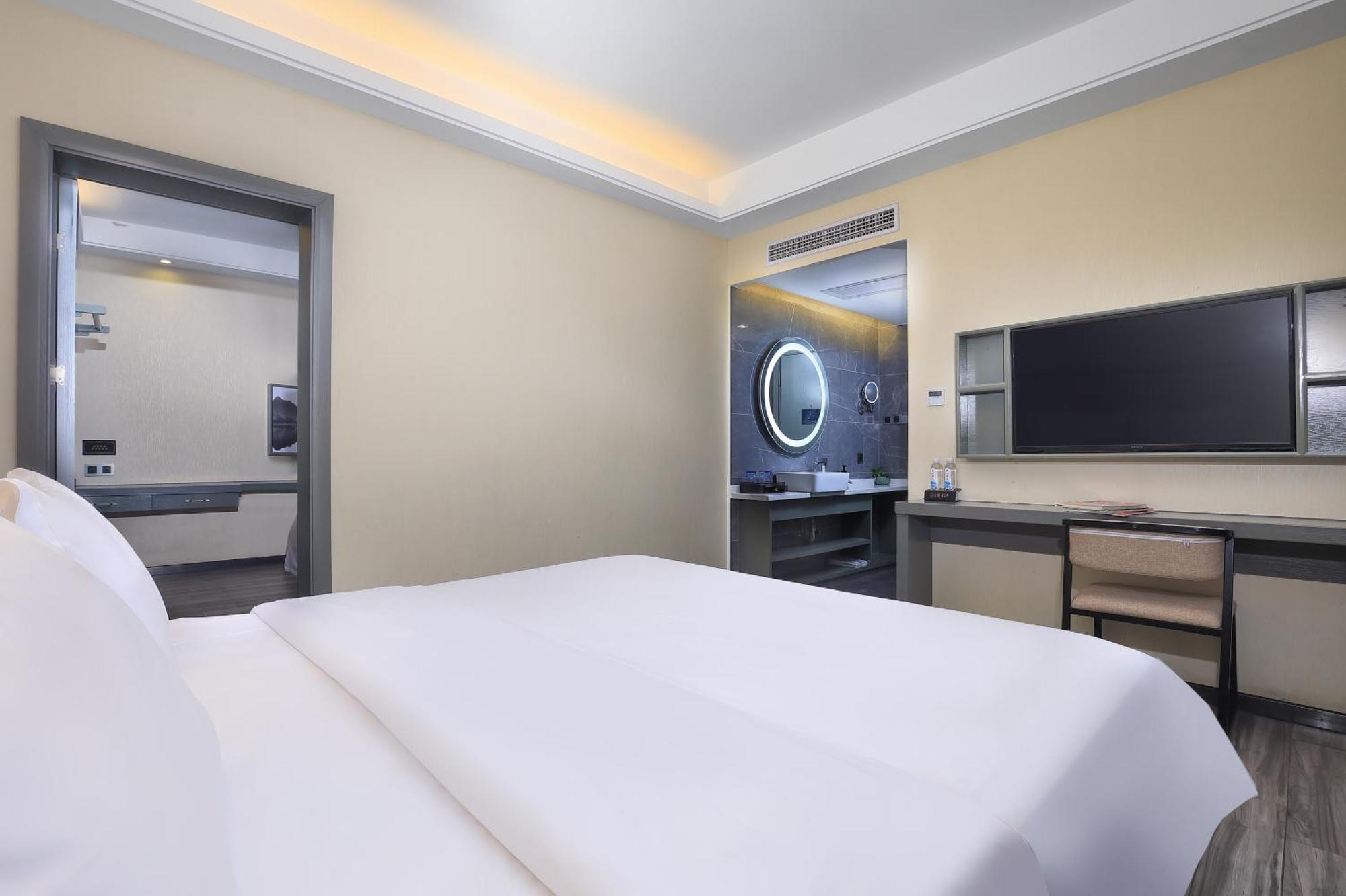 Wing Hotel Guilin - Central Square Стая снимка