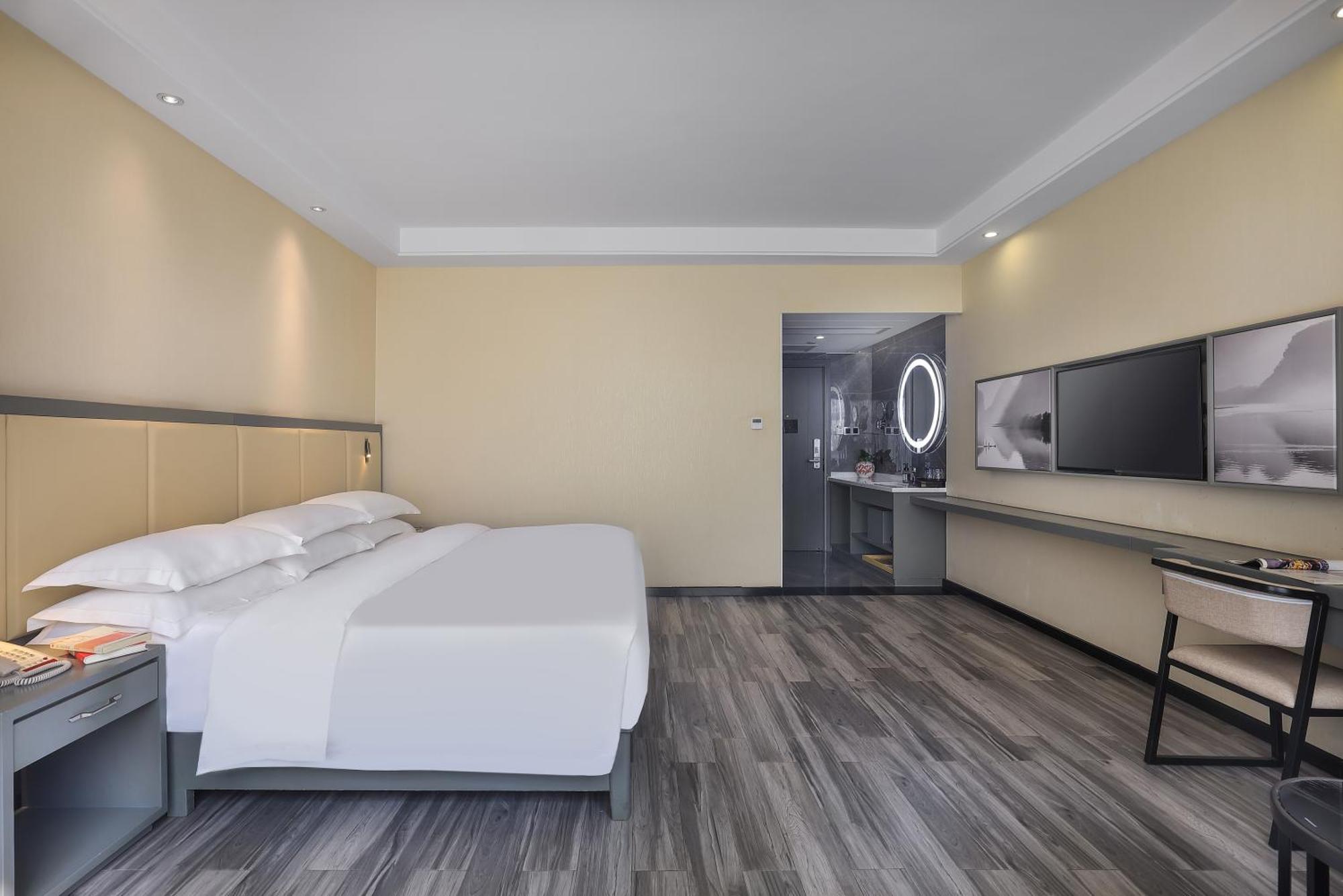 Wing Hotel Guilin - Central Square Стая снимка