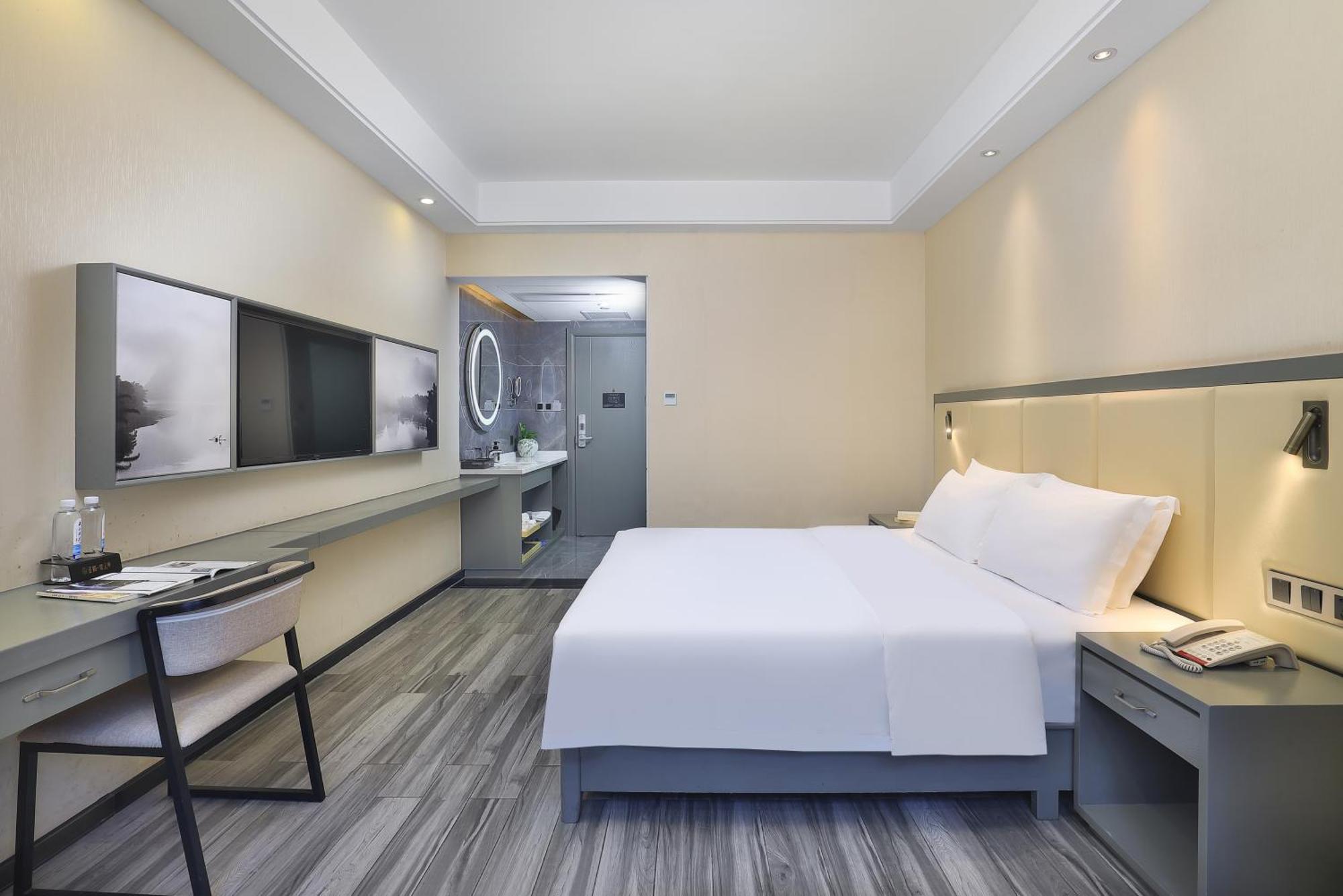 Wing Hotel Guilin - Central Square Стая снимка